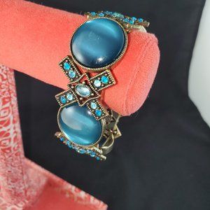 Turquoise and Bronze Colored Elastic Bracelet X's